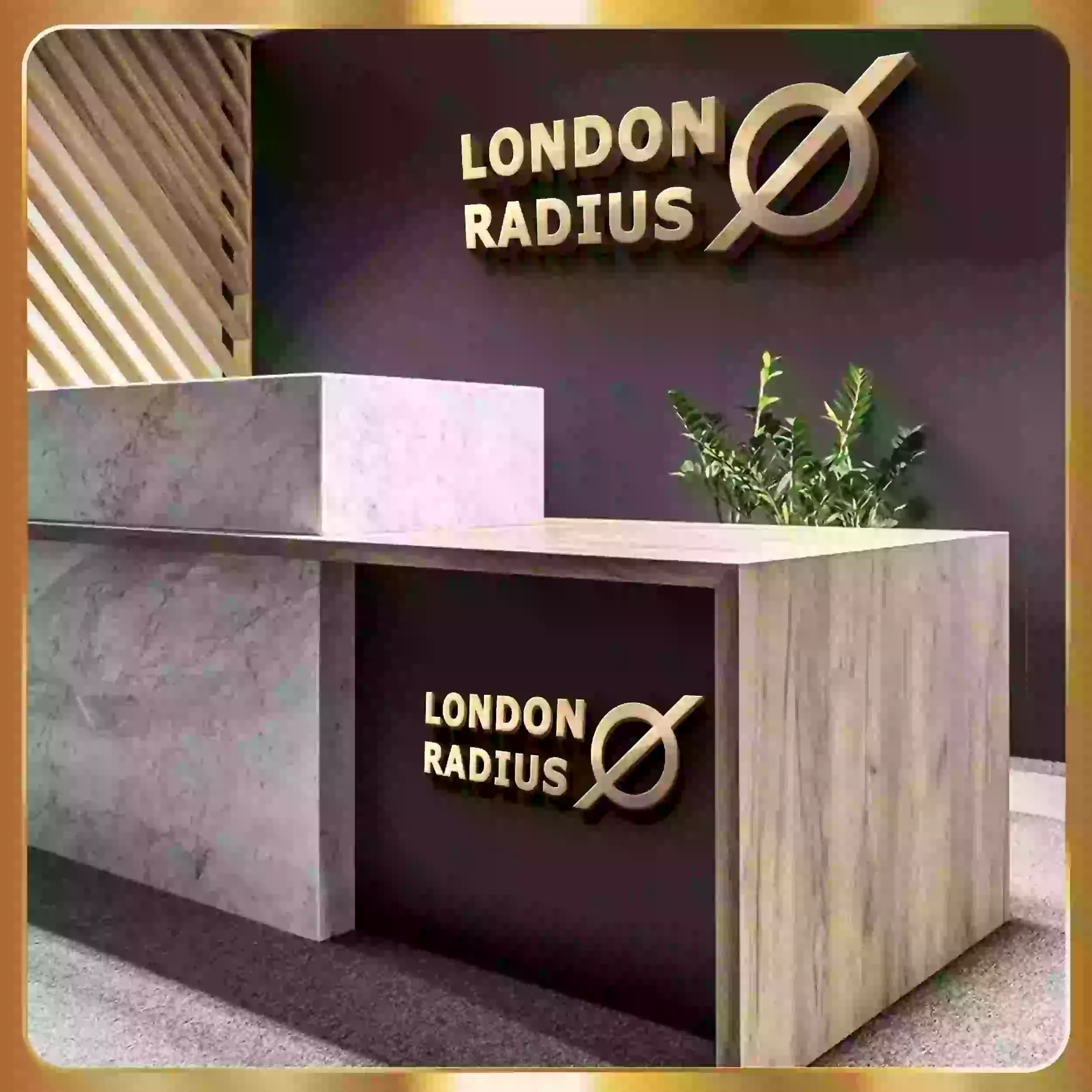 The logo for design advertising is on a desk in a room.